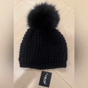 Brand new with tags, Kyi Kyi real fur pom winter hat in black.
